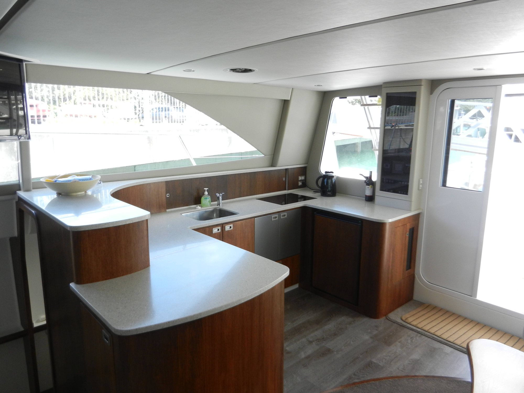 The galley aboard Kozmic 5 with its curved bench
