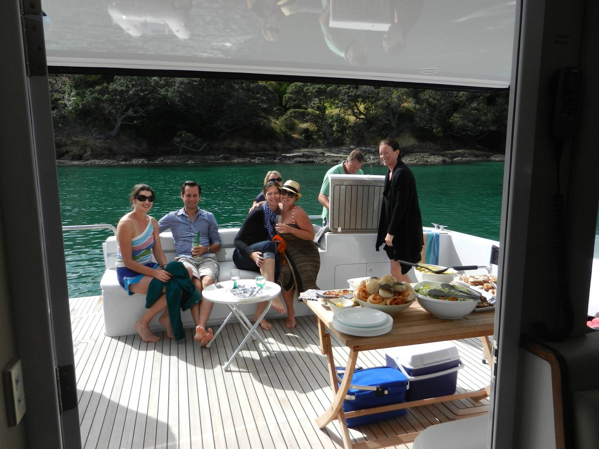 Guests enjoying lunch on the deck of Kozmic 5