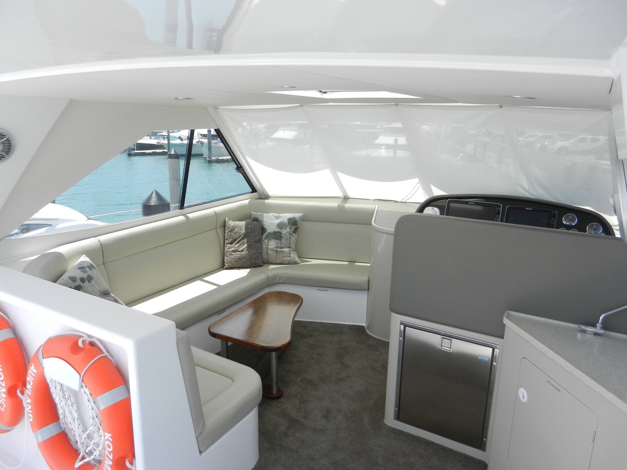The flybridge seating and helm of Kozmic 5